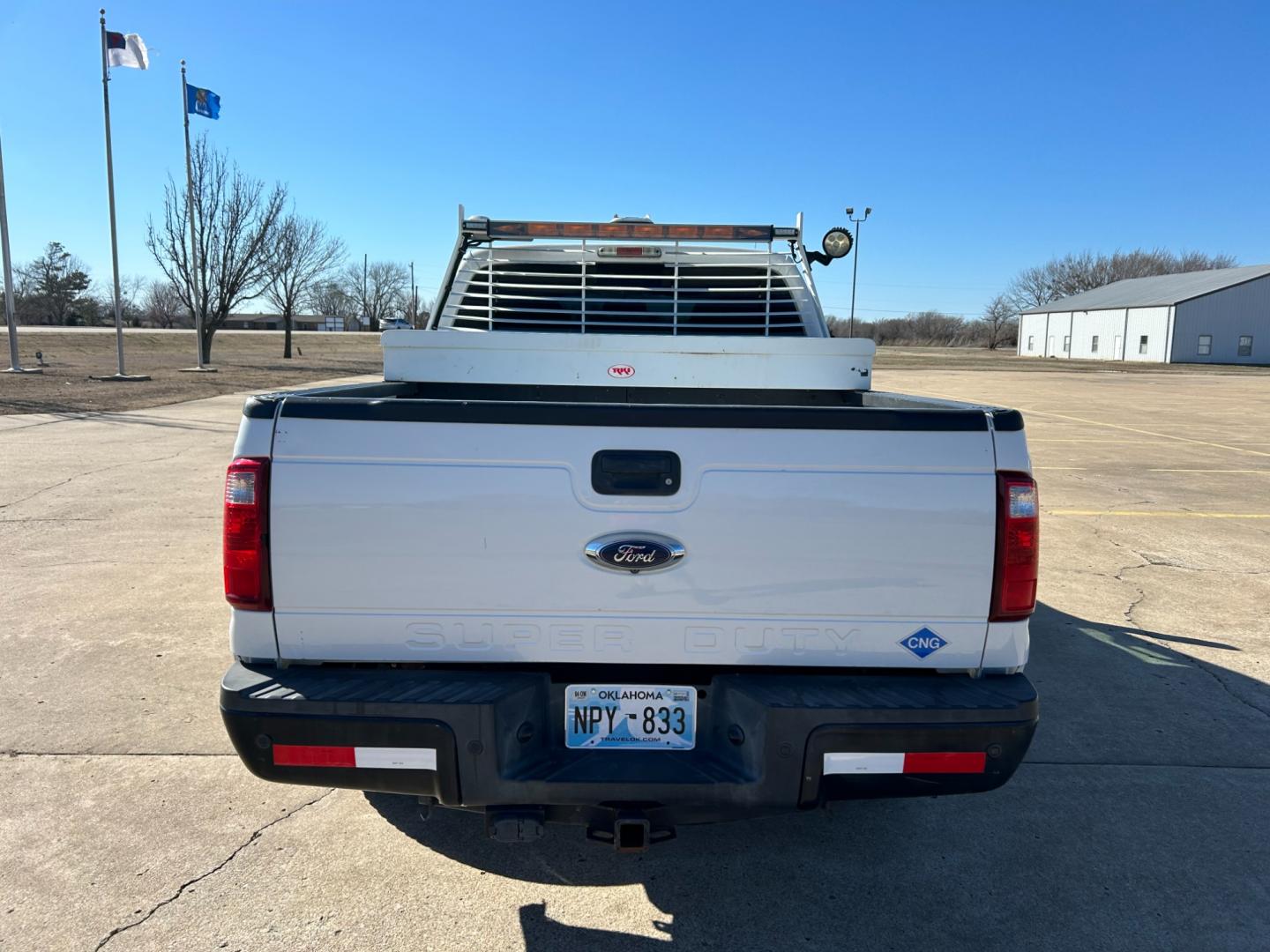 2015 White /Gray Ford F-250 SD (1FT7X2A62FE) with an 6.2L V8 OHV 16V engine, 6-Speed Automatic transmission, located at 17760 Hwy 62, Morris, OK, 74445, (918) 733-4887, 35.609104, -95.877060 - 2015 FORD F250 HAS THE 6.2 V8 ENGINE. THIS TRUCK IS BI-FUEL (RUNS ON BOTH CNG OR GASOLINE) FEATURES MANUAL SEATS, MANUAL LOCKS, MANUAL WINDOWS, MANUAL MIRRORS, AM/FM RADIO, CRUISE CONTROL, TRACTION CONTROL, BACK UP CAMERA. EQUIPPED WITH A WESTPORT BI-FUEL CNG FUEL SYSTEM. IT RUNS ON CNG (COMPRESSED - Photo#5